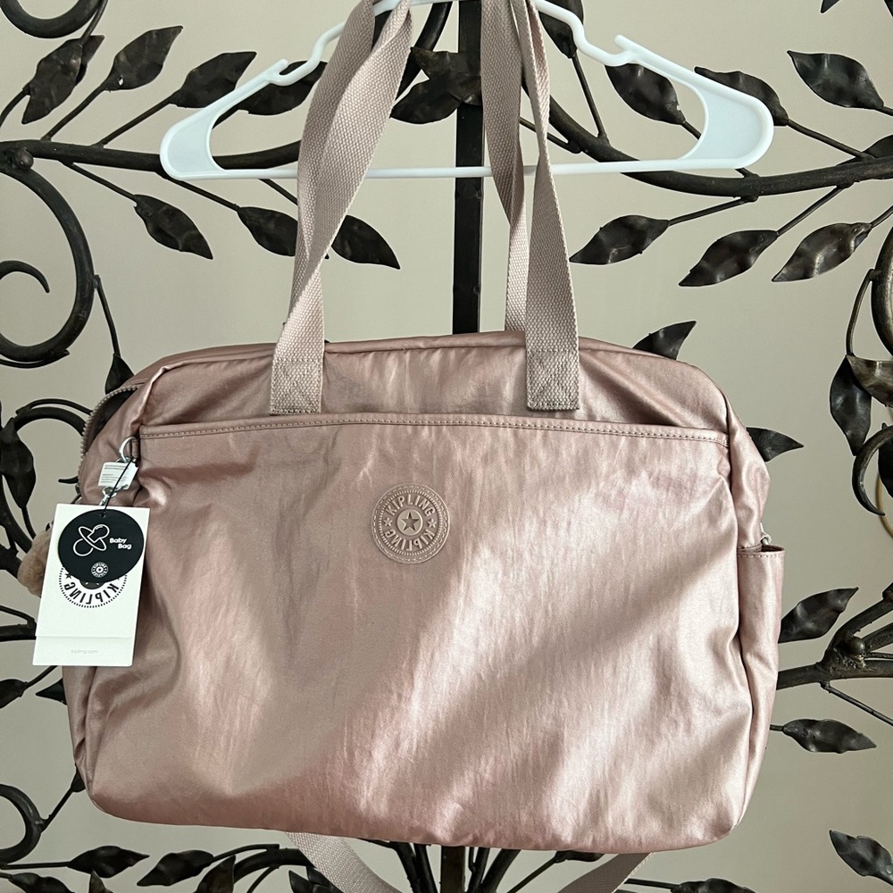 Kipling brand new baby bag in rose gold color or  gym bag. NWT